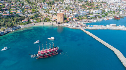 An aerial view of the bay Alanya in Antalya Turkey. Sea and city with an open sky. Kizil Kule - Alanya