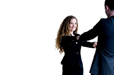 Happy couple wearing suit smiling and embracing each other while looking at each other isolated against white. Professional successful couple embracing together. Relationships and people concept