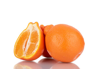 One half and two whole sweet organic minneola, close-up, isolated on white.
