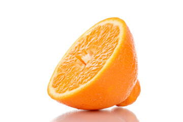 One half of sweet organic minneola, close-up, isolated on white.