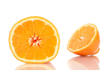 Two half organic ripe minneola, close-up, isolated on white.