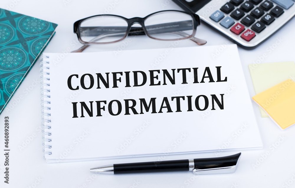 Aufkleber notebook with tools and notes with text confidential information business