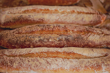 Homemade craft sourdough bread, Crusty Artisan Bread. Freshly baked bread baguettes at home