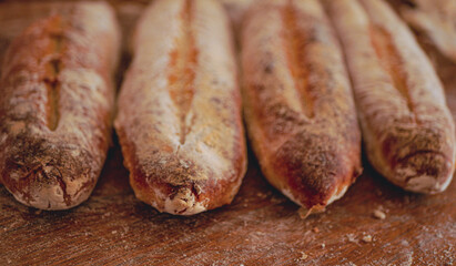 Homemade craft sourdough bread, Crusty Artisan Bread. Freshly baked bread baguettes at home