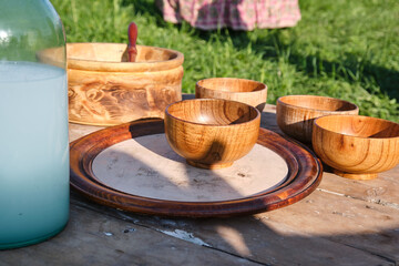 Wooden dishes on picknic table