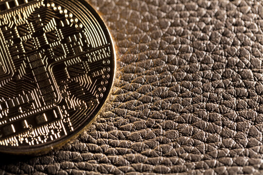 Crypto coin on leather