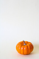 mini pumpkins, orange color, natural, halloween, white background or solid color, minimalist style