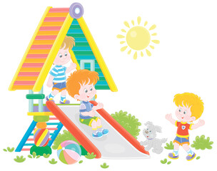 Happy little kids playing on a colorful toy slide on a playground in a green summer park on a sunny day, vector illustration in a cartoon style