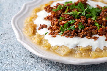 Turkish Ali Nazik Kebab with Yogurt, Minced Meat and Roasted Eggplant or Aubergine Kebap.