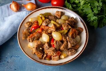 Traditional Turkish meal with delicious meat; onion stew with meat (Turkish name; etli sogan yahnisi, et kavurma)