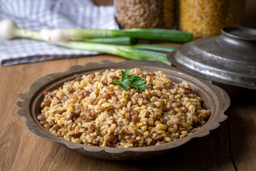 Traditional delicious Turkish foods; bulgur pilaf with green lentils (Turkish name; yesil mercimekli bulgur pilavi)