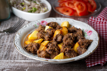 Liver pan (Albanian liver) Turkish traditional food. Liver over rice. (Turkish name; arnavut ciger)