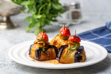 Traditional delicious Turkish food; Kofte kebab wrapped in eggplant (Turkish name; Islim - islim kebabi or kurdan kebabi)