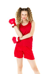 Teen blonde girl fighting in red boxing gloves