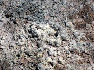 Poisonous sulfur close-up at the bottom of a volcano crater on the island of Nisyros in Greece