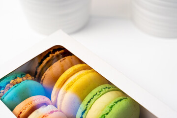 Macaroons in a package. colorful French macaroons. Gift for March 8, Valentine's Day.