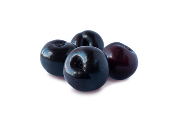 Ripe plums isolated on white background. Heap of plums on white background. fruits with copy space for text. Various fresh summer fruits.