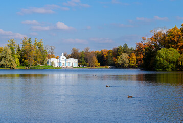 Grand pond with Grotto pavilion in autumn foliage in Catherine park, Pushkin, Saint Petersburg,...