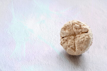 Round halva oriental sweets grey concrete background with copy space.