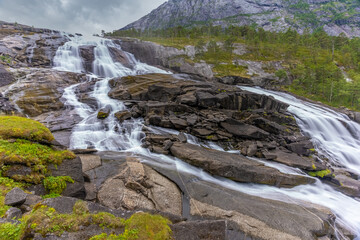 Breathtaking scenery and four majestic waterfalls in Husedalen from Kinsarvik to the Hardangervidda mountain plateau, Norway