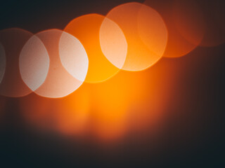 Background, wallpaper with black-orange bokeh.
