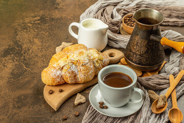 Coffee and croissant, good morning and breakfast concept