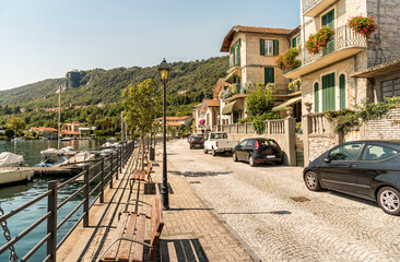 Lakeside promenade in ancient village Pella on the shore of Lake Orta, province of Novara, Piedmont, Italy