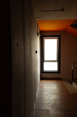 Entrance to the house, multi-storey residential building. Loft style interior.
Orange.