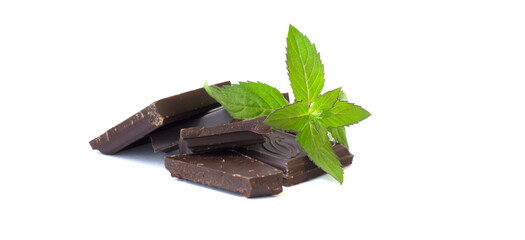 Pieces of chocolate with mint leaf isolated on white