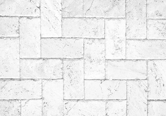 White brick pavers sidewalk background. Neutral texture of a flat brick wall close-up. 