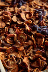 A bunch of sliced dry apple. Dried fruit texture.