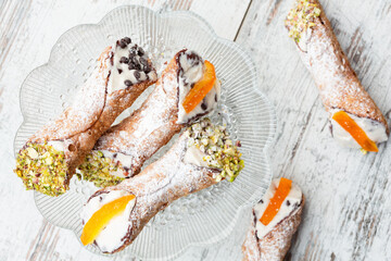 Directly above shot of  sicilian cannoli on a glass plate