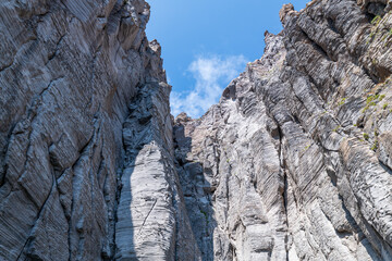 Lipari (Aeolian archipelago), Messina, Sicily, Italy: view of the rocky coast of Basiluzzo island.