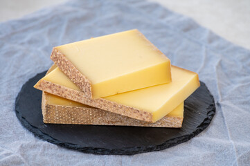 Cheese collection, hard French cheese comte made from  cow milk with rind in Franche-Comte region, France
