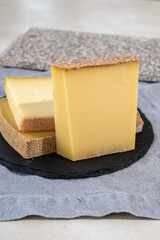 Cheese collection, hard French cheese comte made from  cow milk with rind in Franche-Comte region, France
