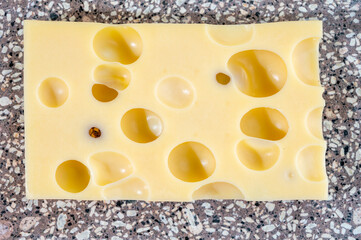 Cheese collection, semi-hard French cheese emmentaler with round holes made from cow milk