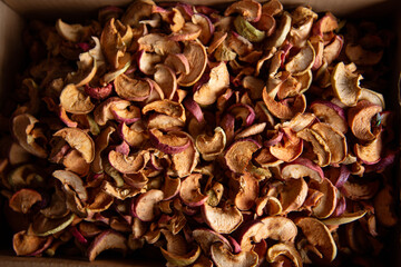 A bunch of sliced dry apple. Dried fruit texture.