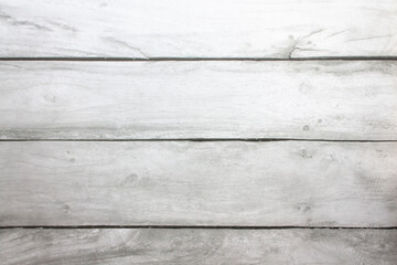 Obraz na płótnie Canvas Light grey wooden plank floor with tree branches and stripes. Light gray background with wooden texture. 