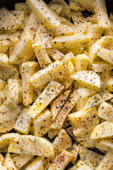Cut spicy raw potatoes texture.
