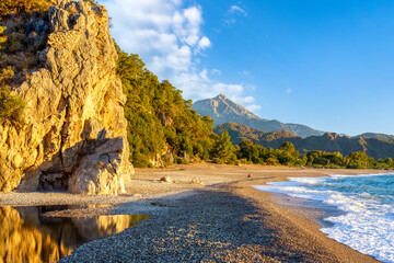 Cirali Olympos beach. Sea and mountains. Kemer, Antalya, Turkey.