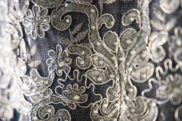 textile embroidery texture with rhinestones