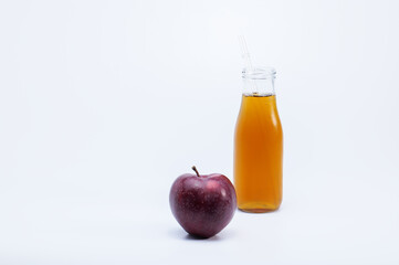 Apple and bottle of apples juice 