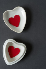 Obraz premium red hearts in heart shaped plates