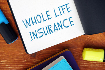 Financial concept meaning WHOLE LIFE INSURANCE exclamation marks with inscription on the sheet.