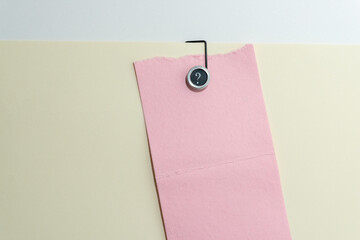 pink and ivory paper with exclamation mark paper clip