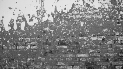 the beautiful ancient texture of the brick and concrete walls. the damaged old wall is weathered, generating a pretty construction texture.