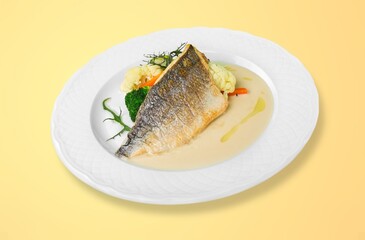 Tasty fish dish in sauce on plate