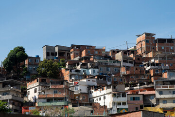 Fototapeta na wymiar urban area with slums, simple buildings usually built on the hillsides of the city