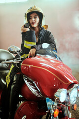 Fototapeta na wymiar stunning girl firefighter