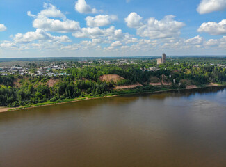 Fototapeta na wymiar Aerial view of the high bank of Vyatka and a grain elevator (Kotelnich, Kirov region, Russia)